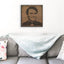 Carved wood portrait of Abdel Halim Hafez with “Ahwak” song in a living room.
