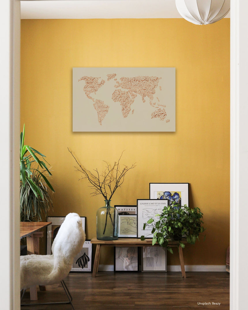 Carved wood artwork of the world map, featuring country names in a living room.