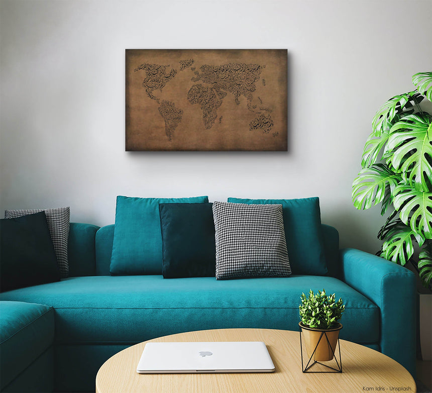 Carved wood artwork of the world map, featuring country names in a living room.