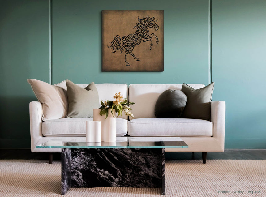 Wooden artwork of a horse with Al-Mutanabbi verses in Arabic calligraphy in a living room.