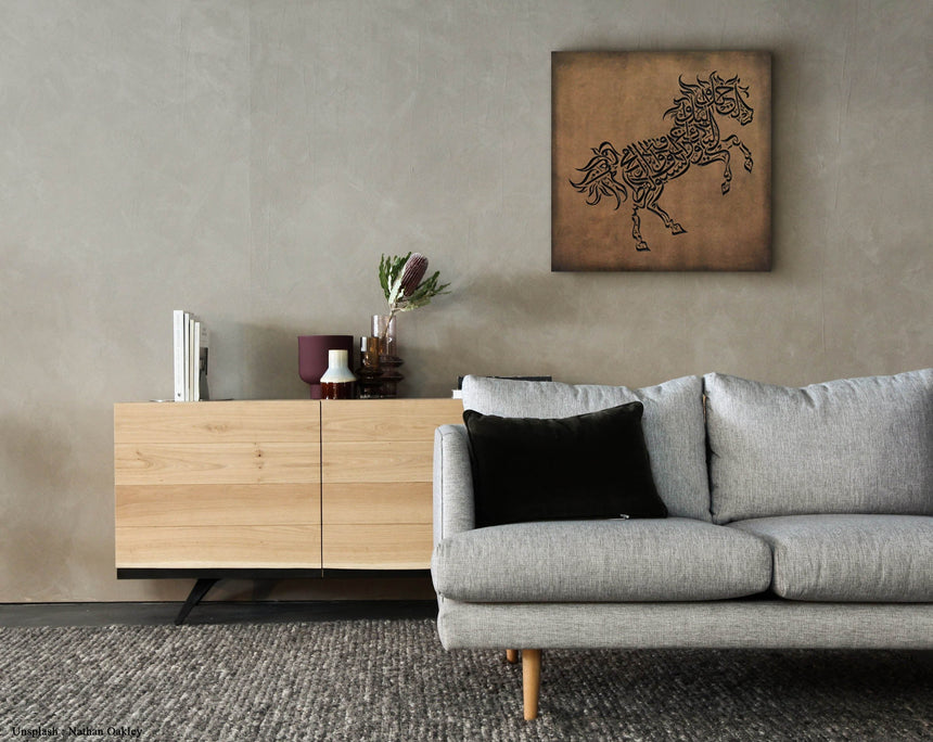Wooden artwork of a horse with Al-Mutanabbi verses in Arabic calligraphy in a living room.