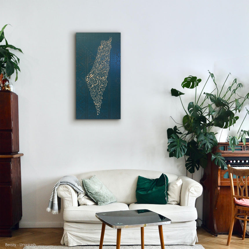 Palestine map in Diwani calligraphy using the names of its cities, with Palestinian tatreez–inspired embroidery in a living room .
