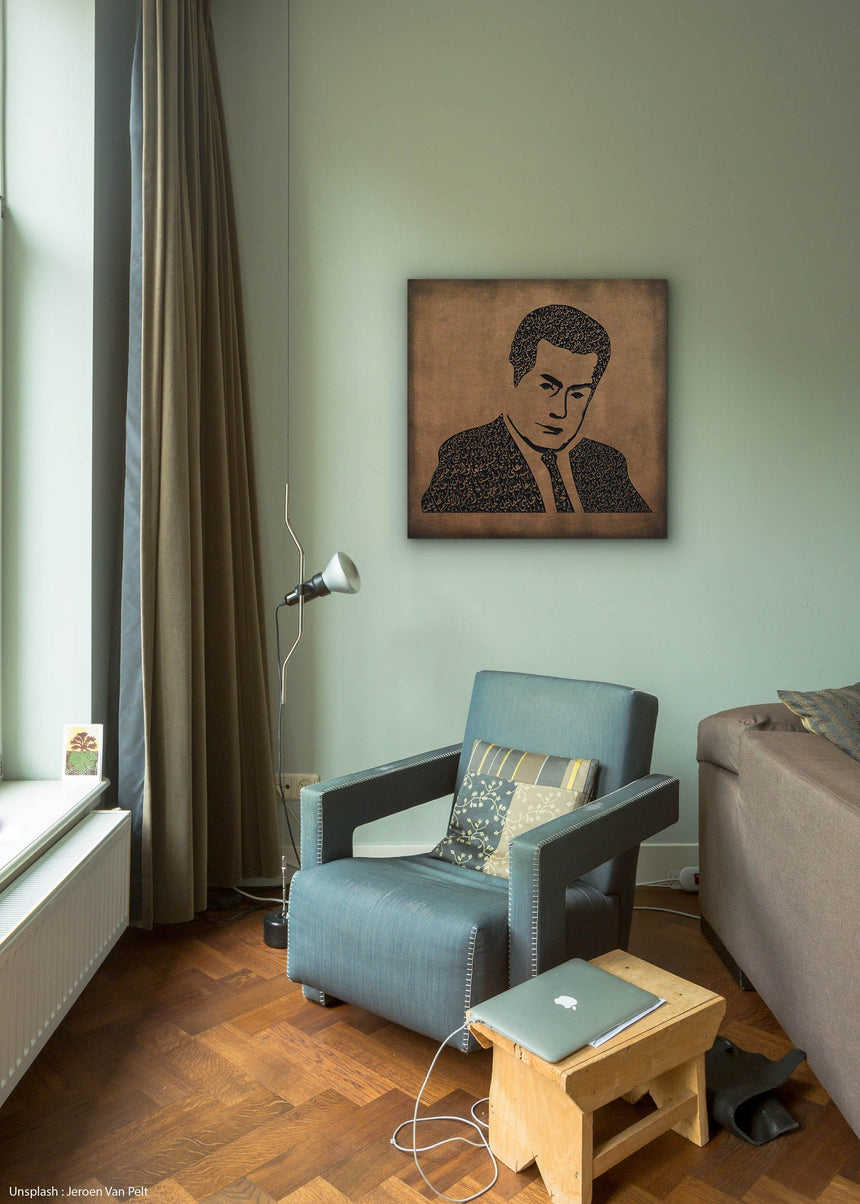 Carved wood portrait of Farid al-Atrash with “Ya Habaybi Ya Ghaybin” in a living room.
