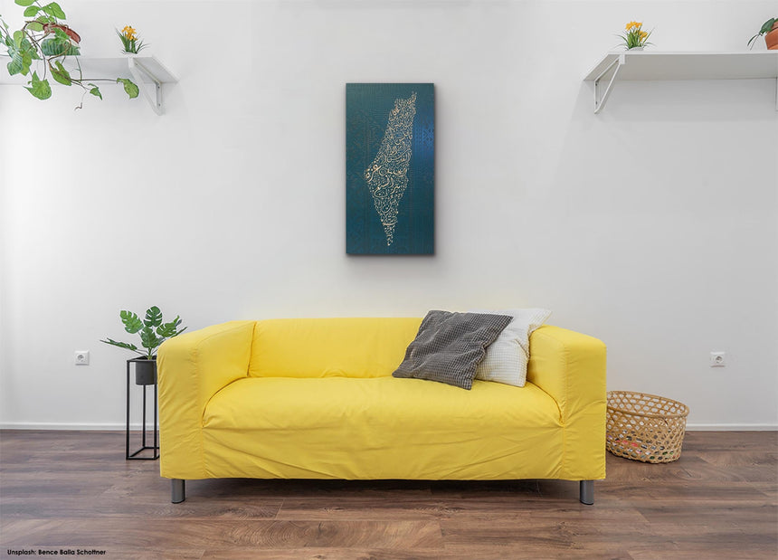 Palestine map in Diwani calligraphy using the names of its cities, with Palestinian tatreez–inspired embroidery in a living room.