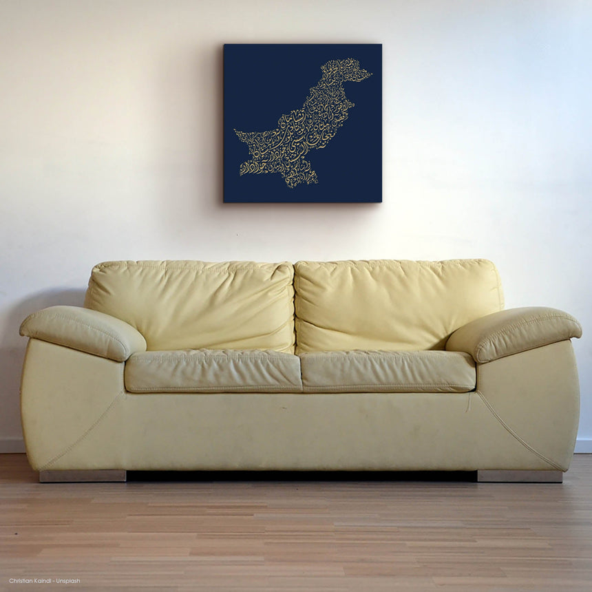 Carved wood artwork of the Pakistan map, featuring the names of its cities in a living room.