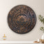 Carved wood artwork of the Dome of the Rock, Aztec-inspired concentric motifs with olive branches.
