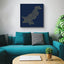 Carved wood artwork of the Pakistan map, featuring the names of its cities in a living room.