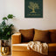 Wooden artwork of an olive tree with the quote “We will remain as long as thyme and olives remain.”  in a living room