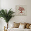 Wooden artwork of an olive tree with the quote “We will remain as long as thyme and olives remain.”  in a living room