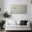 Square Kufic wood artwork featuring the 99 Names of Allah in a modern living room with a white sofa.