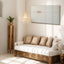Square Kufic wood artwork featuring the 99 Names of Allah in a sunlit room with a painting on the wall.