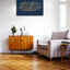Quranic verse 14:7 — “If you are grateful, I will surely increase you,” in a living room