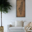Living room with the Palestine map, featuring the names of its cities.