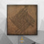 Carved wooden artwork featuring the four “Qul” surahs in Thuluth Arabic calligraphy.