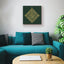 Carved wooden artwork of Surah An-Nas in a living room