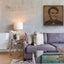 Carved wood portrait of Abdel Halim Hafez with “Ahwak” song in a living room.