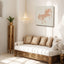 Wooden artwork of a horse with Al-Mutanabbi verses in Arabic calligraphy in a living room.