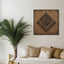 Carved wooden artwork of Surah An-Nas in a living room