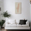 Living room with the Palestine map, featuring the names of its cities.