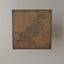 Carved wood artwork of the Pakistan map, featuring the names of its cities up close