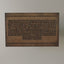 Wooden artwork of Ayat al-Kursi in Kufic calligraphy up close